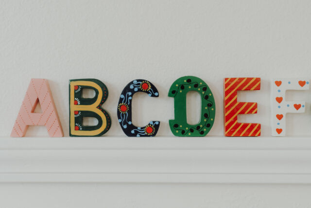 Hand-decorated alphabet letters on the classroom wall