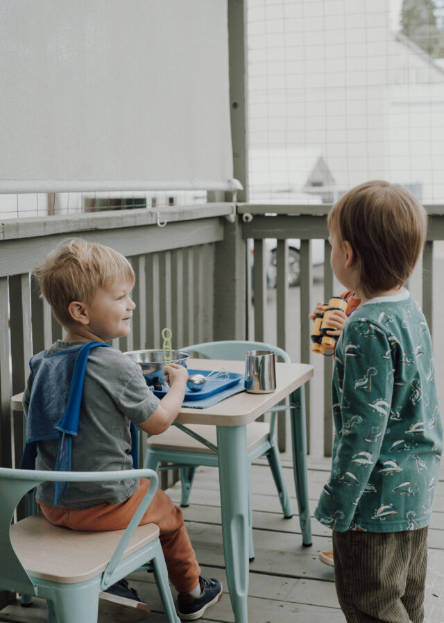 Two friends share water work on the deck