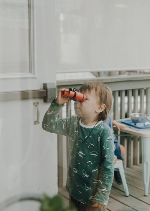 Peeking through the spyglass on the deck