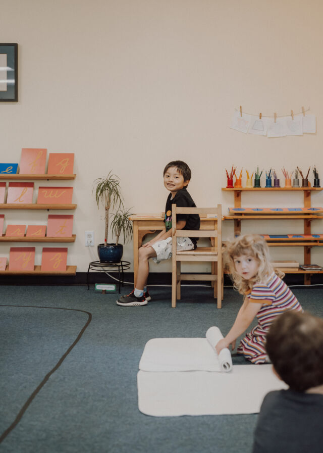Choosing materials from the classroom shelves
