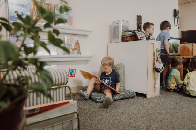 Reading in the classroom book corner