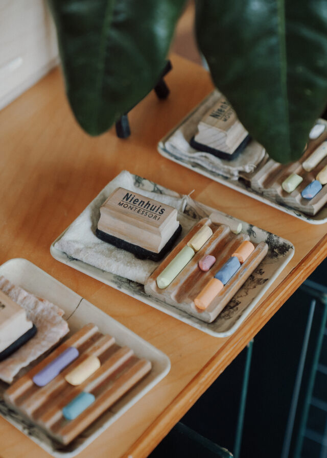 Trays of colored pencils ready for work