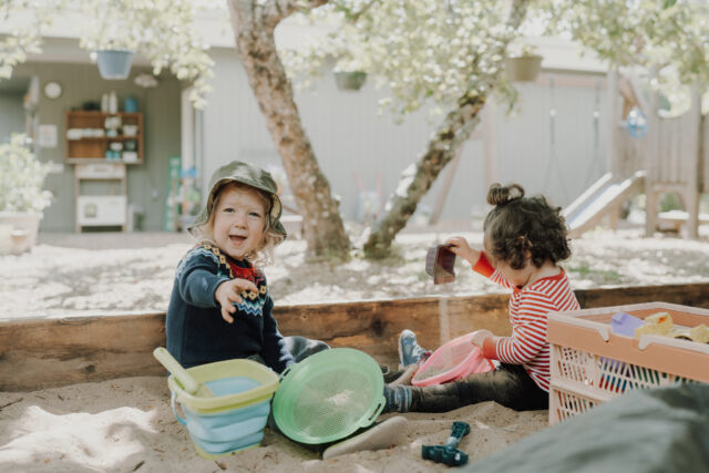 Digging together in the sand pit