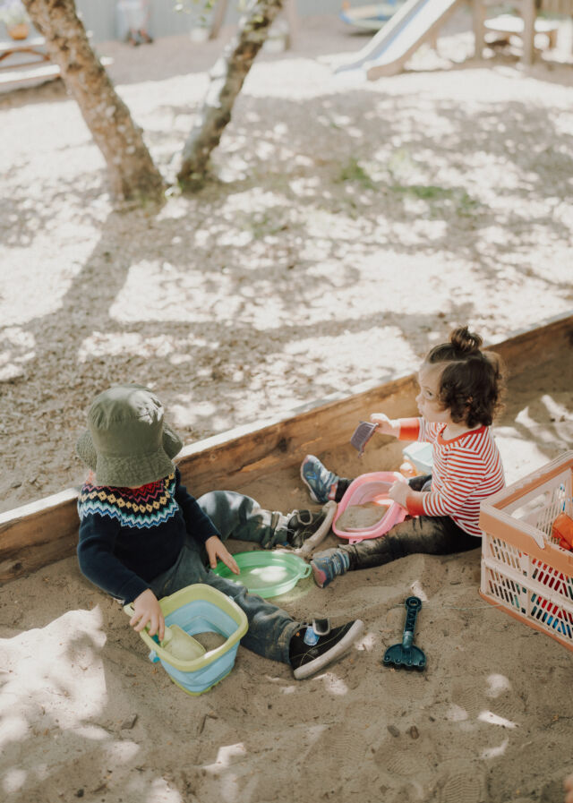 Digging together in the sand pit
