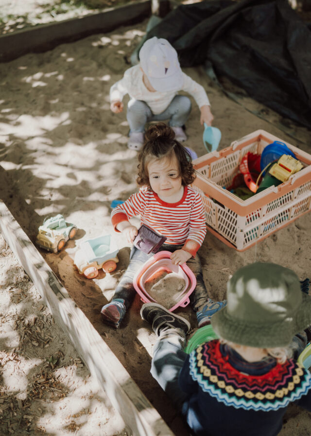 Digging together in the sand pit