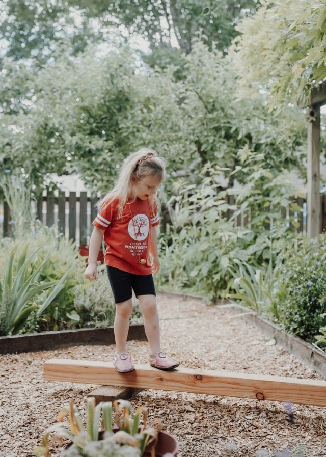 Walking the balance beam in the garden