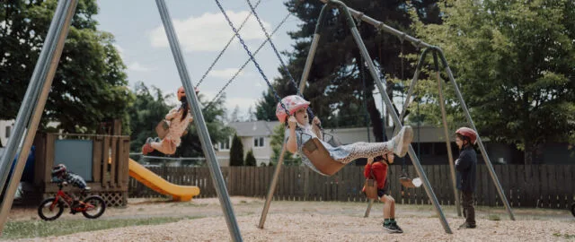 Mid-flight on the swings